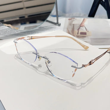 Juno Cute Cat Eye Rimless Glasses Gold Metal Frames With Spiral Temples