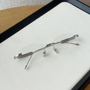 Echo Oval Rimless Glasses Silver Metal Frame With Adjustable Nose Pads