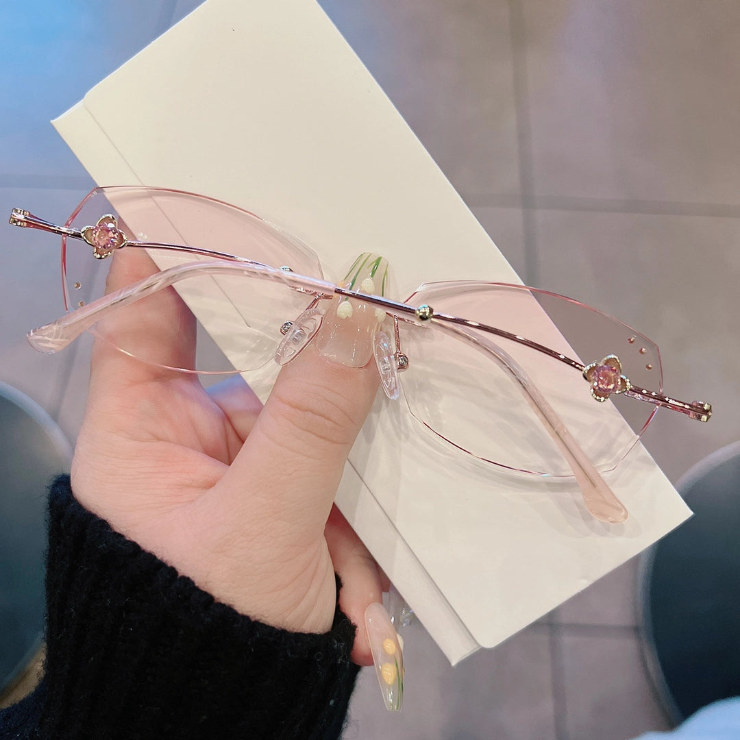 Vega Geometric Rimless Glasses With Branch Temples And Bud Detail