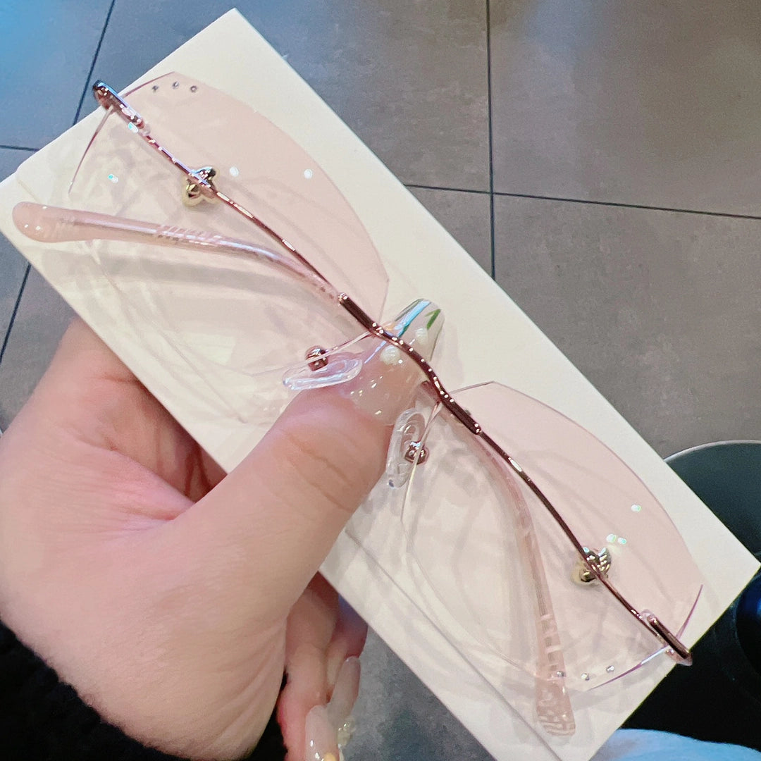 Vega Geometric Rimless Glasses With Branch Temples And Bud Detail