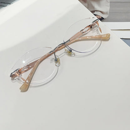 Juno Cute Cat Eye Rimless Glasses Gold Metal Frames With Spiral Temples