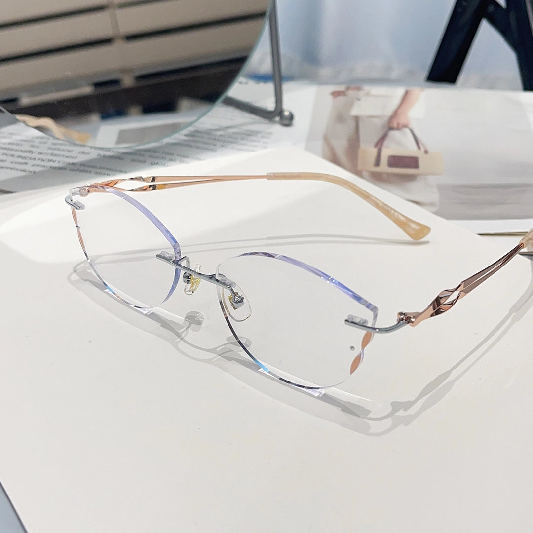 Juno Cute Cat Eye Rimless Glasses Gold Metal Frames With Spiral Temples