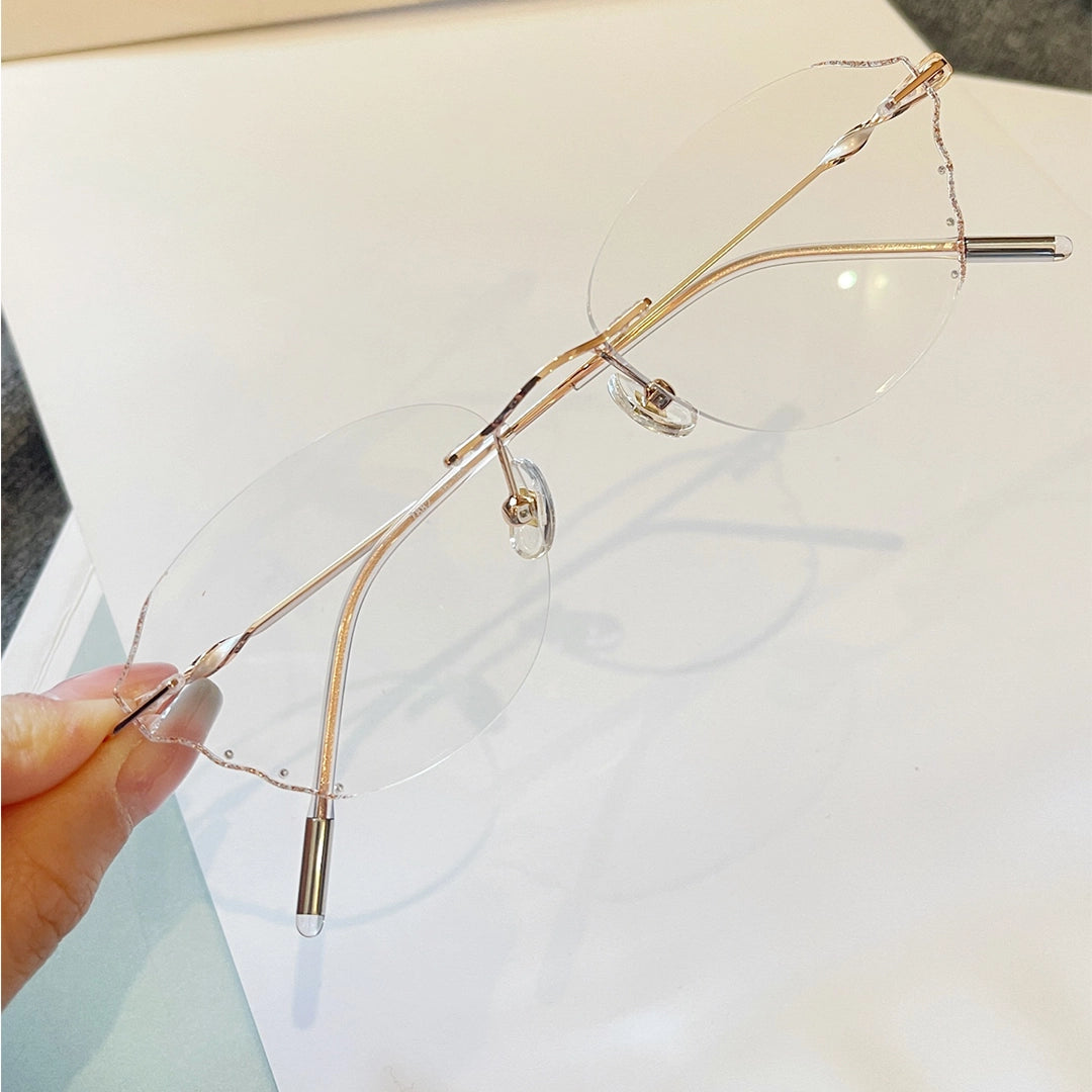 Solstice Geometric Polygon Rimless Glasses With Twisted Metal Temples For Women
