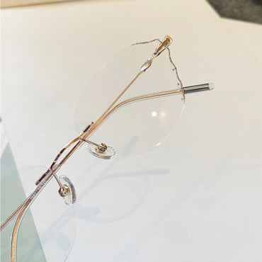 Solstice Geometric Polygon Rimless Glasses With Twisted Metal Temples For Women