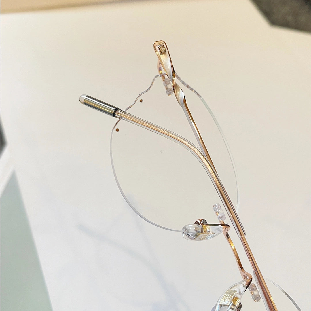 Solstice Geometric Polygon Rimless Glasses With Twisted Metal Temples For Women