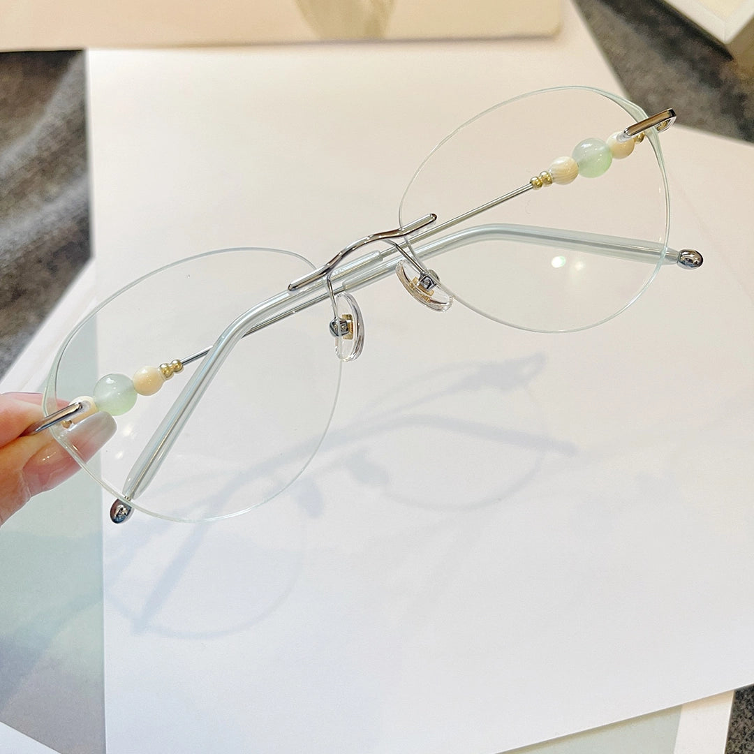 Catty Cat Eye Rimless Prescription Glasses For Women With Pearl Temple Accents