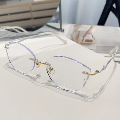 Juno Cute Cat Eye Rimless Glasses Gold Metal Frames With Spiral Temples