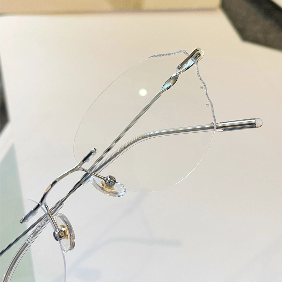 Solstice Geometric Polygon Rimless Glasses With Twisted Metal Temples For Women