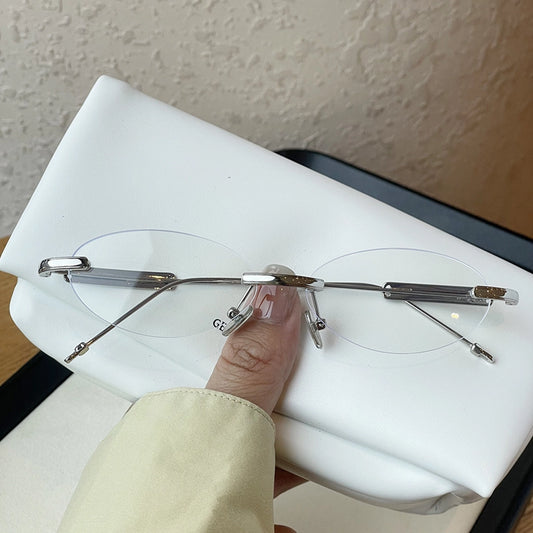 Echo Oval Rimless Glasses Silver Metal Frame With Adjustable Nose Pads